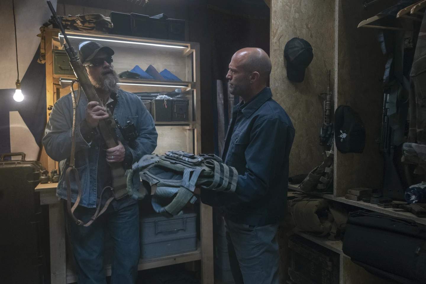 David Harbour (left) and Jason Statham (right) in a scene from A Working Man