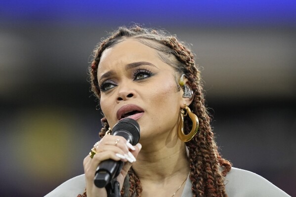 Andra Day performs "Lift Every Voice and Sing" before the NFL Super Bowl 58 football game between the Kansas City Chiefs and the San Francisco 49ers, Sunday, Feb. 11, 2024, in Las Vegas. (AP Photo/Brynn Anderson)