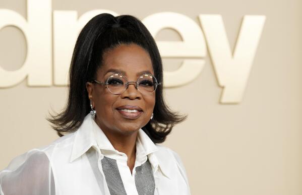 FILE - Oprah Winfrey, a producer of the documentary "Sidney," about actor Sidney Poitier, appears at the premiere on Sept. 21, 2022 in Los Angeles. Winfrey announced that she had chosen Ann Napolitano’s book "Hello Beautiful" for her 100th book club pick. (AP Photo/Chris Pizzello, File)