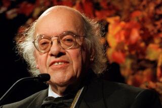 FILE - Gerald Stern speaks to the audience during the National Book Awards in New York Wednesday, Nov. 18, 1998. Stern, one of the country’s most loved and respected poets who wrote with spirited melancholy and earthly humor about his childhood, Judaism, mortality and the wonders of the contemplative life, has died. He was 97. According to his longtime partner, Anne Marie Macari, Stern died Thursday, Oct. 27, 2022 at Calvary Hospice in New York City,. (AP Photo/Osamu Honda, File)