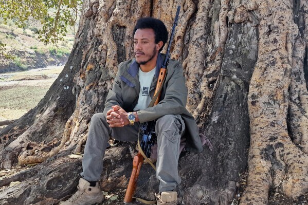 Asres Mare Damte, a Fano militia member, poses for a photo in the Amhara region of northern Ethiopia, Tuesday, Feb. 11, 2025. (AP Photo)