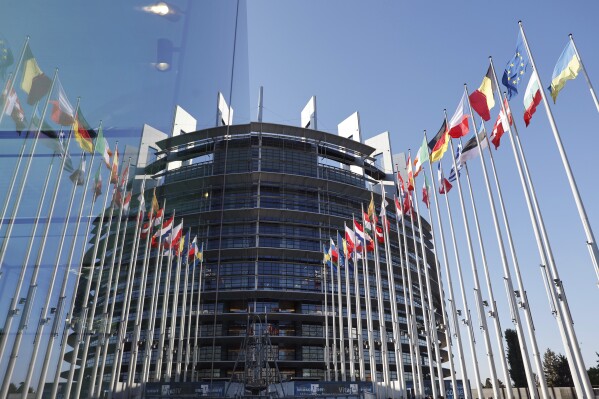 FILE - European countries ' flag fly at the European Parliament, Tuesday, April 23, 2024 in Strasbourg. The European election will take place on June 9, 2024. Nearly 300 signatories have signed an open 10-point letter before next month's European Parliament election, saying lawmakers should be putting democracy at the top of their agenda in an increasingly authoritarian world. (Ǻ Photo/Jean-Francois Badias, File)