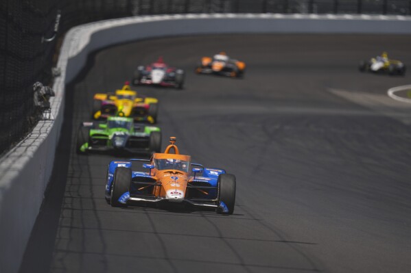 Scott Dixon, of New Zealand, drives into the second turn during the final practice for the Indianapolis 500 auto race at Indianapolis Motor Speedway in Indianapolis, Friday, May 24, 2024. (AP Photo/Michael Conroy)