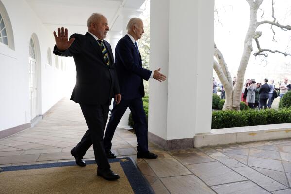 President Joe Biden and Brazilian President Luiz Inacio Lula da Silva walk along the Colonnade next to the Rose Garden at the White House in Washington, Friday, Feb. 10, 2023. (Jonathan Ernst/Pool via AP)