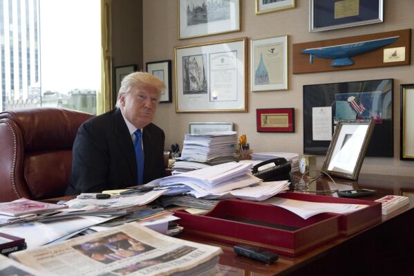 FILE - Then-Republican presidential candidate Donald Trump is photographed during an interview with The Associated Press in his office at Trump Tower in New York, May 10, 2016. The legal investigation into former President Donald Trump's handling of sensitive information is the culmination of a lifelong habit of collecting memorabilia, disregard of rules governing recordkeeping and a chaotic transition of his own making after refuse to accept defeat in 2020. (AP Photo/Mary Altaffer, File)