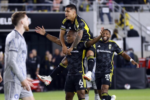Crew clinch top-4 seed, eliminate Montreal with 2-1 victory | AP News