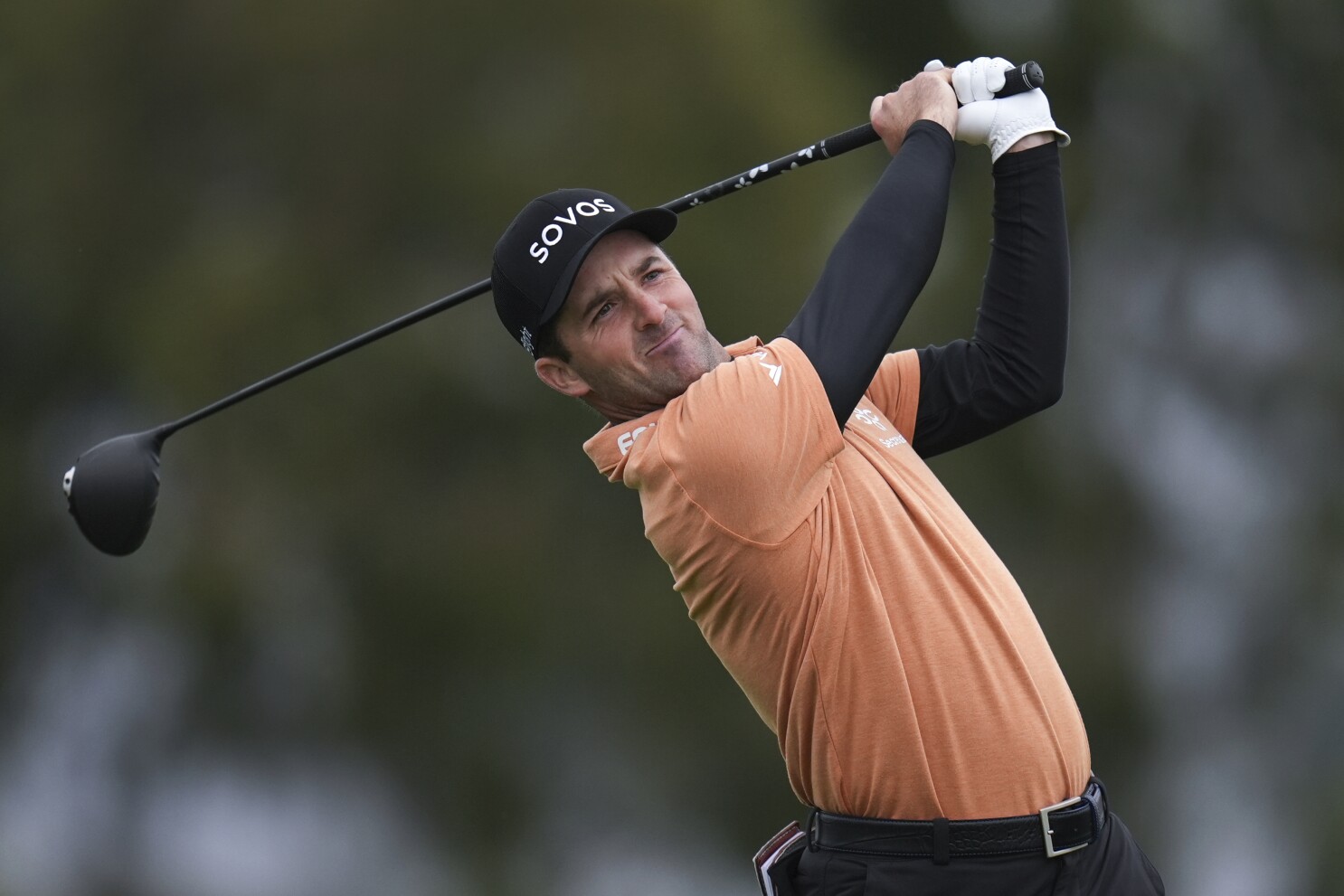 McCarthy's big finish gives him the lead in the cold rain and brutal test of Torrey Pines