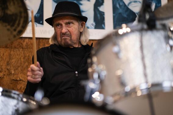 Drummer Alan White plays his drums in this undated photo. White, the longtime drummer for progressive rock pioneers Yes who also played on projects with John Lennon and George Harrison, has died. He was 72. (Dean Rutz/The Seattle Times via AP)