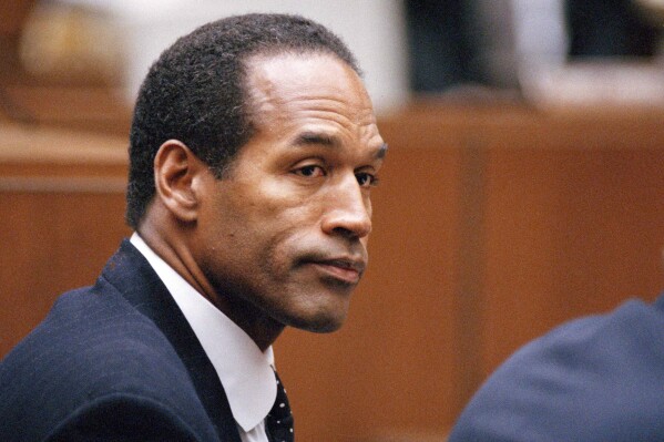 FILE - O.J. Simpson sits at his arraignment in Superior Court in Los Angeles on July 22, 1994. O.J. Simpson's attorney Malcolm LaVergne is now handling the deceased former football star, actor and famous murder defendant's financial estate. (AP Photo/Pool/Lois Bernstein, Pool)
