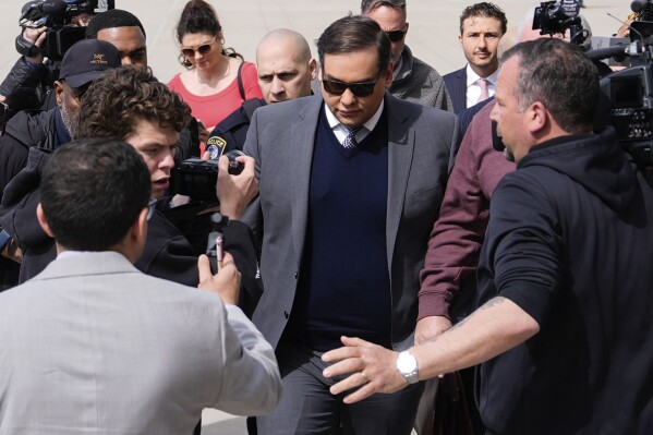 Former U.S. Rep. George Santos arrives at federal court for sentencing, Friday, April 25, 2025, in Central Islip, N.Y. (AP Photo/Julia Demaree Nikhinson)