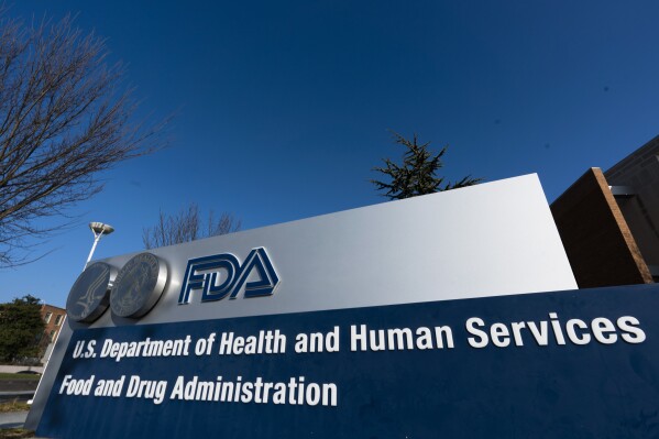 FILE- A sign is displayed for the Food and Drug Administration offices in Silver Spring, Md., on Dec. 10, 2020. (AP Photo/Manuel Balce Ceneta, File)