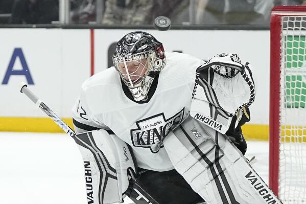 Los Angeles Kings goaltender Jonathan Quick deflects a shot during the first period of an NHL hockey game against the Arizona Coyotes Saturday, Feb. 18, 2023, in Los Angeles. (AP Photo/Mark J. Terrill)
