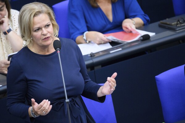 Federal Minister of the Interior and Home Affairs Nancy Faeser speaks during the government questioning in the plenary session in the German Bundestag, in Berlin, Germany, Wednesday Sept. 20, 2023. (Bernd von Jutrczenka/dpa via AP)