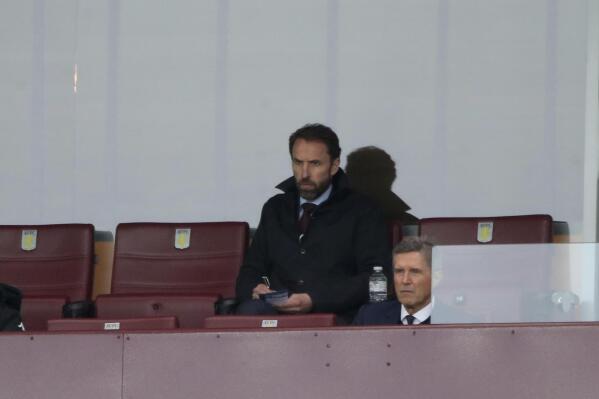 England manager Gareth Southgate watches the English Premier League soccer match between Aston Villa and Chelsea, at Villa Park stadium in Birmingham England, Sunday, May 23, 2021. (Nick Potts, Pool via AP)