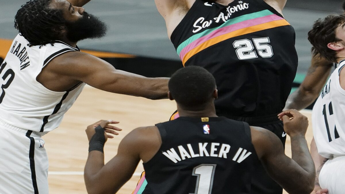Harden's triple-double helps Nets escape in OT against Spurs - The