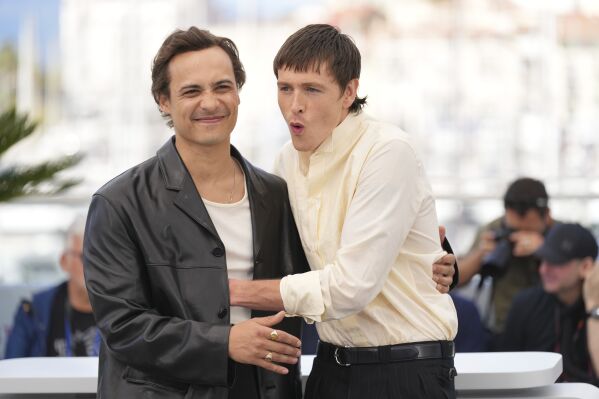 Frank Dillane, left, and Harris Dickinson posing for photographers at the photo Call for the Film 'Undin' at the 78th International Film Festival, Cannes, Southern France, Saturday, May 17, 2025. (AP Photo/Natacha Pisarenko)
