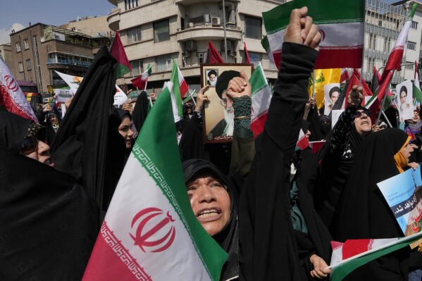 FILE - Iranian worshippers chant slogans during an anti-Israeli gathering after Friday prayers in Tehran, Iran, Friday, April 19, 2024. The apparent crash of a helicopter carrying Iranian President Ebrahim Raisi, the country's foreign minister and other top officials is likely to reverberate across the Middle East. Tensions have soared since the start of the Israel-Hamas war, and Israel and Iran directly traded fire for the first time ever in April. (AP Photo/Vahid Salemi, File)