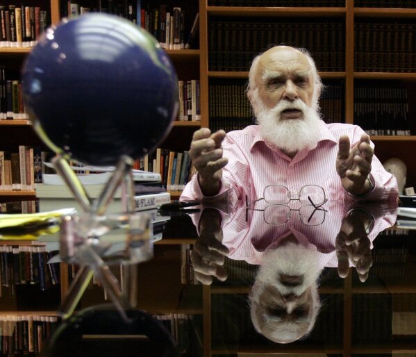 CORRECTS DAY OF DEATH TO TUESDAY, OCT. 20 INSTEAD OF MONDAY, OCT. 19 - FILE - In this Friday, June 29, 2007, file photo, James Randi talks to a reporter in Fort Lauderdale, Fla. Magician Randi, whose daring escapes were later eclipsed by his work as the country’s foremost skeptic, has died. The Florida-based James Randi Educational Foundation announced its founder died Tuesday, Oct. 20, 2020, at 92. (AP Photo/Alan Diaz)