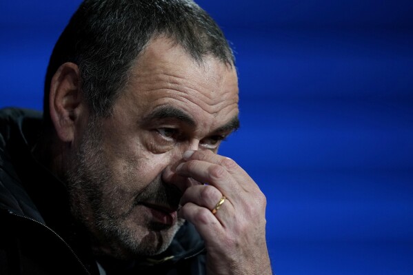 Lazio head coach Maurizio Sarri arrives for a news conference in Munich, Germany, Monday, March 4, 2024, ahead of the Champions League round of sixteen second leg soccer match between FC Bayern Munich and Lazio Rome. (AP Photo/Matthias Schrader)