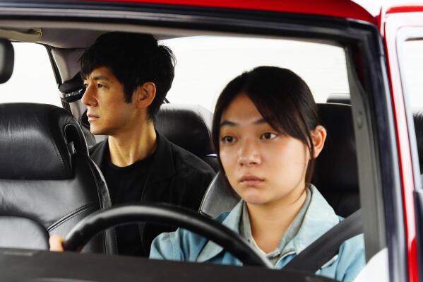 FILE - This image released by Janus Films and Sideshow shows Hidetoshi Nishijima, left, and Toko Miura in a scene from "Drive My Car." (Janus Films and Sideshow via AP, File)