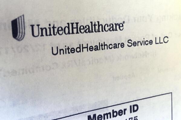 FILE - In this June 15, 2018 file photo, United Healthcare correspondence is seen in North Andover, Mass.   UnitedHealth Group thumped Wall Street’s first-quarter expectations, Thursday, April 14, 2022, and raised its 2022 forecast, as growing Medicare Advantage coverage and care delivery once again bolstered the health care giant. (AP Photo/Elise Amendola, File)