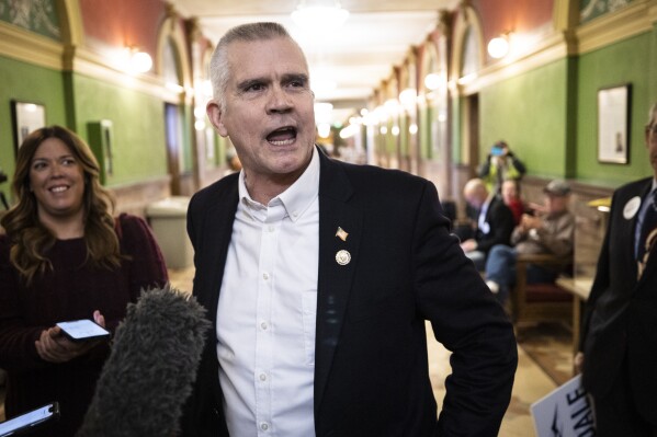 FILE - U.S. Rep. Matt Rosendale, R-Mont., speaks with reporters after filing to run for the U.S. Senate on Friday, Feb. 9, 2024 in the Montana State Capitol in Helena, Mont. Rosendale announced Friday, March 8, he would no longer be seeking re-election — the second time he's filed and dropped out of a congressional race in the past month. (Thom Bridge/Independent Record via AP, File)