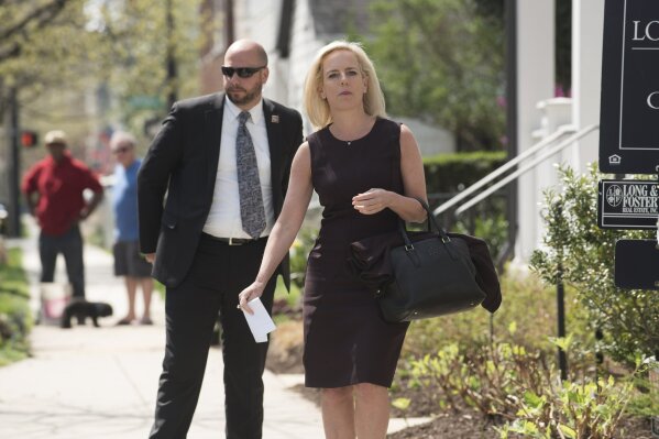 
              Homeland Security Secretary Kirstjen Nielsen talks outside her home in Alexandria, Va., on Monday, April 8, 2019. Nielsen says she continues to support the president’s goal of securing the border in her first public remarks since her surprise resignation.  (AP Photo/Kevin Wolf)
            