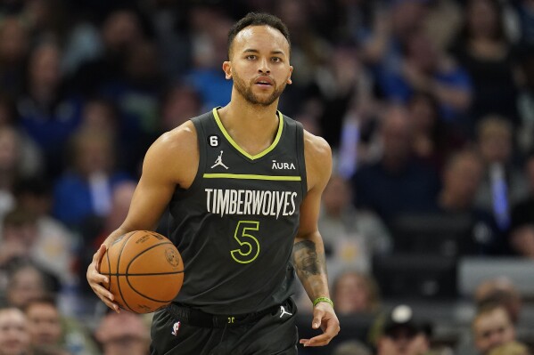 FILE - Minnesota Timberwolves forward Kyle Anderson (5) dribbles down the court during the first half of an NBA basketball play-in tournament game against the Oklahoma City Thunder, Friday, April 14, 2023, in Minneapolis. Timberwolves sixth man Kyle Anderson will play for China in the FIBA Basketball World Cup starting next month. Anderson and the Chinese Basketball Association on Monday, July 24, announced Anderson's addition to the roster. Anderson's maternal great grandfather was Chinese, making Anderson eligible to play for China as a naturalized citizen. (AP Photo/Abbie Parr)