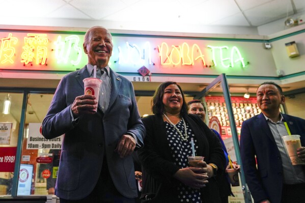 President Joe Biden talks during a stop at No. 1 Boba Tea during a stop in Las Vegas, Monday, Feb. 5, 2024. Biden is going small to try to win big in November. With 10 months to go until Election Day, the Democratic incumbent is all in on minimalist events — visits to a bubble tea store, a family's kitchen and a barbershop, for example — rather than big rallies.(AP Photo/Stephanie Scarbrough)