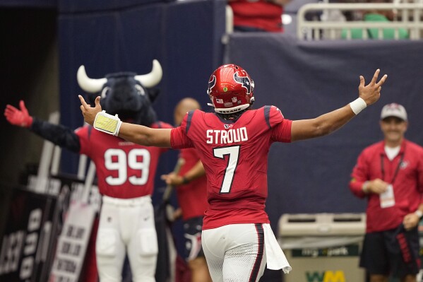 Houston Texans quarterback C.J. Stroud (7) celebrate his touchdown pass against the Pittsburgh Steelers during the second half of an NFL football game Sunday, Oct. 1, 2023, in Houston. (AP Photo/David J. Phillip)