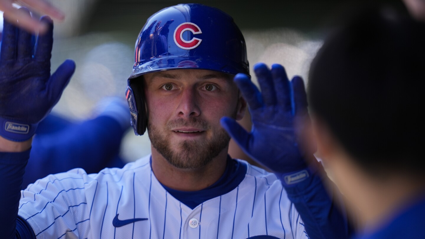 Michael Busch homers for Chicago Cubs against former team | AP News