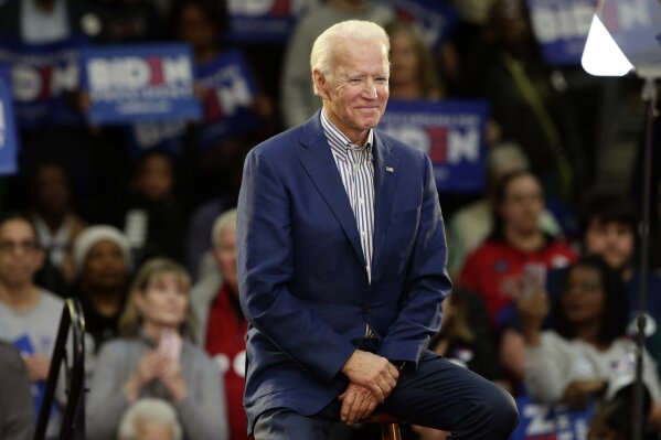 Democratic presidential candidate former Vice President Joe Biden smiles at supporters during a campaign event at Saint Augustine's University in Raleigh, N.C., Saturday, Feb. 29, 2020. (AP Photo/Gerry Broome)