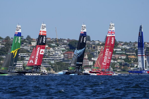 Boats start in a race two of the SailGP series on Sydney Harbour, Sydney, Australia, Sunday, Feb. 25, 2024. (AP Photo/Mark Baker)