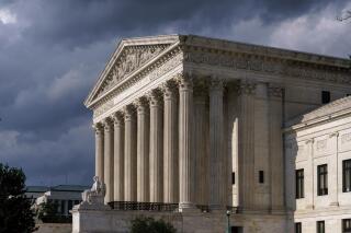 In this June 8, 2021 photo, the Supreme Court is seen in Washington. (AP Photo/J. Scott Applewhite)