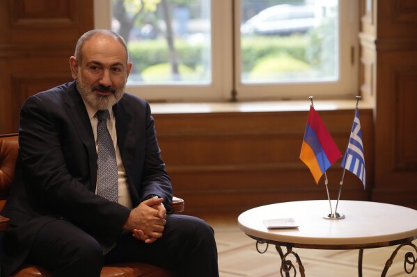 Armenian Prime Minister joins a meeting with his Greek counterpart Kyriakos Mitsotakis, not pictured, at Maximos Mansion in Athens, Greece, Tuesday, Feb. 27, 2024. (AP Photo/Thanassis Stavrakis)