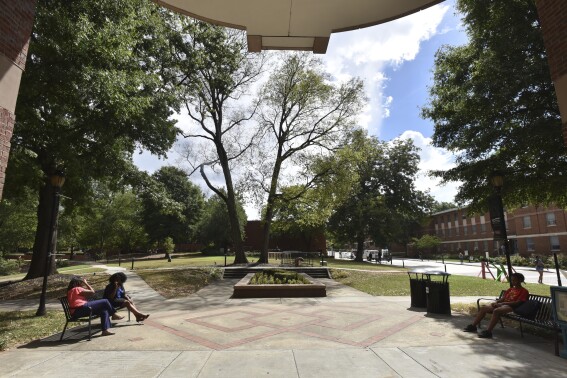 FILE - In this Sept. 26, 2018, file photo, students sit on the campus of Spelman College in Atlanta. A collaborative of 40 historically Black colleges and universities has received a gift of $124 million from Blue Meridian Partners, a philanthropic collaborative. The new funding announced Wednesday, Sept. 13, 2023 will be used to increase enrollment, increase graduation rates and improve the employment rate of the schools' graduates. (Hyosub Shin/Atlanta Journal-Constitution via AP, File)