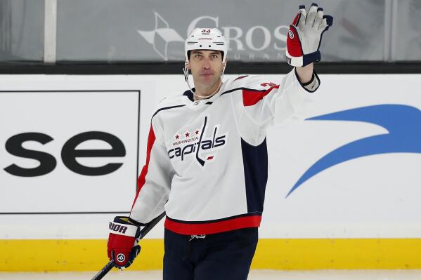 Washington Capitals' Zdeno Chara waves to the crowd after a video tribute during the first period of an NHL hockey game against his former team the Boston Bruins, Sunday, April 11, 2021, in Boston. (AP Photo/Michael Dwyer)