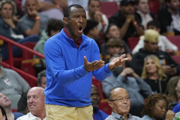 Detroit Pistons coach Dwane Casey gestures during the first half of the team's NBA basketball game against the Miami Heat, Tuesday, March 15, 2022, in Miami. (AP Photo/Marta Lavandier)