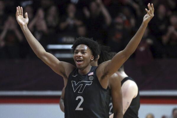 Virginia Tech's Michael Collins Jr.(2) celebrates after getting a defensive rebound in the final moments of an NCAA college basketball game against Duke in Blacksburg, Va., Monday, Jan. 23 2023. (Matt Gentry/The Roanoke Times via AP)