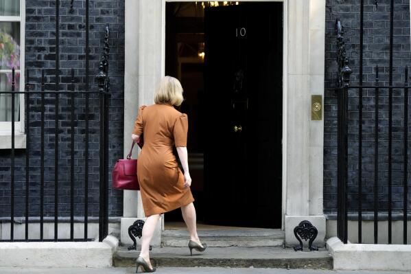 FILE - British Foreign Secretary Liz Truss arrives for a cabinet meeting at 10 Downing Street in London, Tuesday, July 19, 2022. Britain's new leader, Liz Truss, is the child of left-wing parents who grew up to be an admirer of Conservative Prime Minister Margaret Thatcher. Now she is taking the helm as prime minister herself, with a Thatcherite zeal to transform the U.K. One colleague who has known Truss since university says she is “a radical” who wants to “roll back the intervention of the state” in people’s lives, just as Thatcher once did. (AP Photo/Frank Augstein, File)