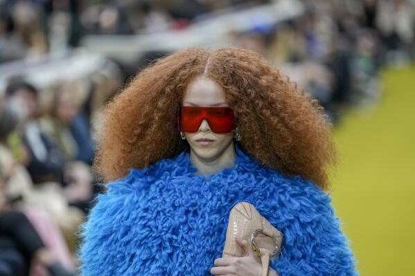 A model wears a creation as part of the Gucci women's Fall-Winter 2023-24 collection presented in Milan, Italy, Friday, Feb. 24, 2023. (AP Photo/Antonio Calanni)
