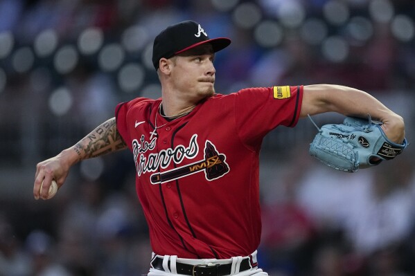 Atlanta Braves starting pitcher A.J. Smith-Shawver works against the Chicago Cubs in the first inning of a baseball game, Thursday, Sept. 28, 2023, in Atlanta. (AP Photo/John Bazemore)