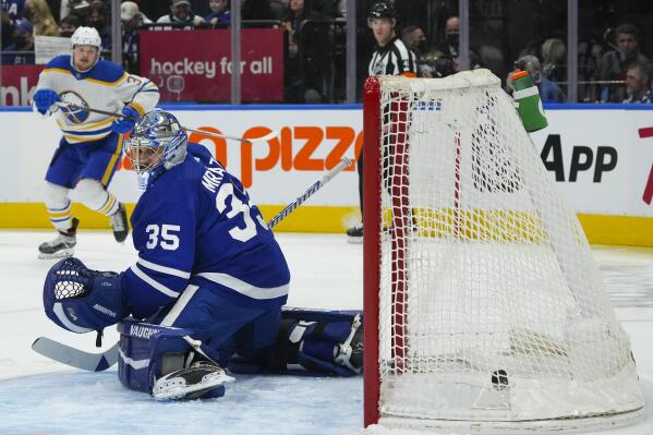 Toronto Maple Leafs goaltender Petr Mrazek (35) looks back to his net after being scored on by the Buffalo Sabres' Jacob Bryson, not shown, during the first period of an NHL hockey game Wednesday, March 2, 2022 in Toronto. (Nathan Denette/The Canadian Press via AP)