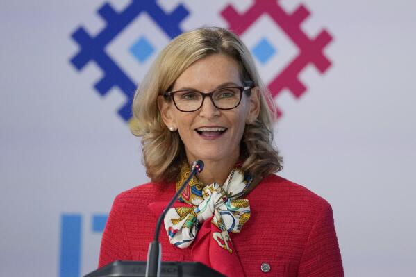 Doreen Bogdan-Martin of the United States, secretary general elect of the ITU, speaks to media after winning elections of The International Telecommunication Union (ITU), the United Nations specialised agency for information and communication technologies, in Bucharest, Romania, Thursday, Sept. 29, 2022. The ITU Plenipotentiary Conference 2022 elected Bogdan-Martin, the first woman to ever hold the position of Secretary General.(AP Photo/Andreea Alexandru)