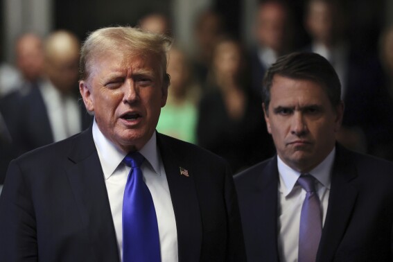 Former President Donald Trump speaks to the media alongside his attorney Todd Blanche after the conclusion of his hush money trial in New York, Thursday, May 30, 2024. (Michael M. Santiago/Pool Photo via AP)