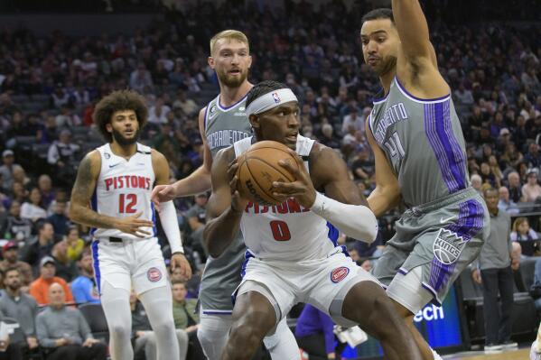 Detroit Pistons center Jalen Duren (0) is guarded by Sacramento Kings forward Trey Lyles (41) during the first quarter of an NBA basketball game in Sacramento, Calif., Sunday, Nov. 20, 2022. (AP Photo/Randall Benton)