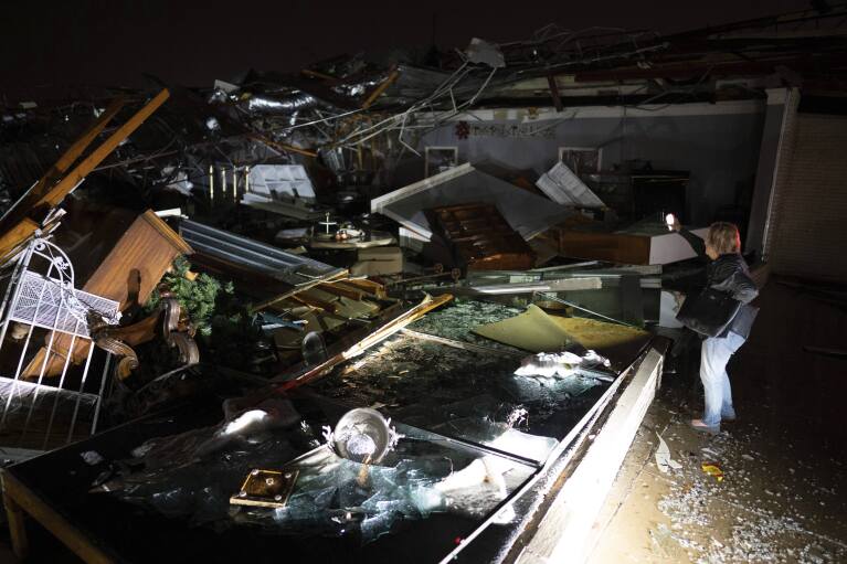 A business destroyed by a tornado on West Main in Hendersonville, Tenn., is seen, Saturday, Dec. 9, 2023. (Andrew Nelles/The Tennessean via AP)