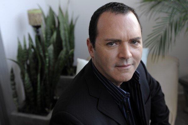 FILE - Christopher Ciccone, brother of Madonna and author of "Life With My Sister Madonna," poses for a portrait in Los Angeles, Friday, August 1, 2008. (AP Photo/Chris Pizzello, File)
