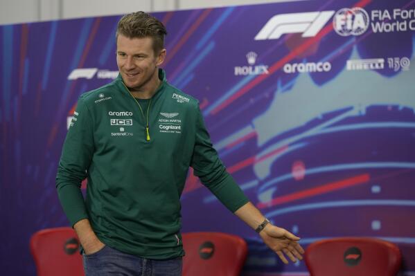 Aston Martin driver Nico Hulkenberg of Germany gestures during a press conference at the Formula One Bahrain International Circuit in Sakhir, Bahrain, Friday, March 18, 2022. The Bahrain Formula One Grand Prix will take place here on Sunday. (AP Photo/Hassan Ammar)