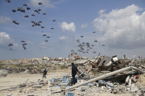 FILE - Humanitarian aid is airdropped to Palestinians over Gaza City, Gaza Strip on March 25, 2024. (AP Photo/Mahmoud Essa, File)